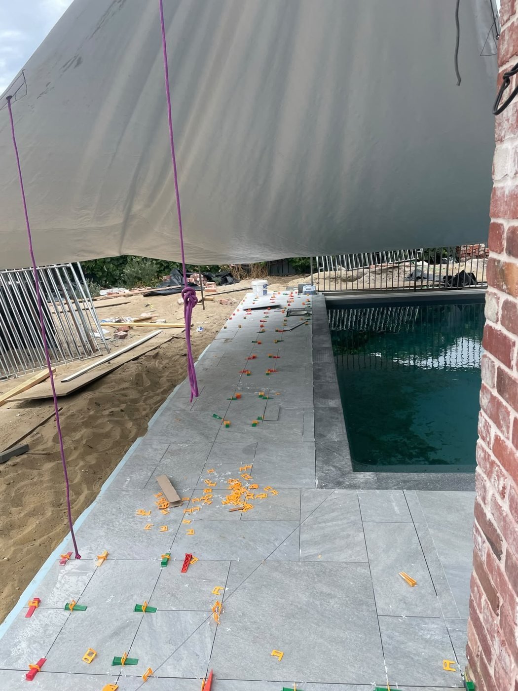Pool Surround Tiling — slip-rated pavers and coping to the pool edge, Scarborough, WA